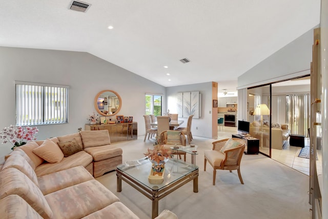2430 NW 12th St, Delray Beach, FL 33445 - living room featuring vaulted ceiling, light carpet, a fireplace, and recessed lighting