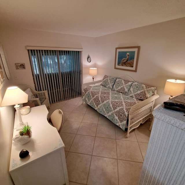 bedroom featuring light tile patterned floors