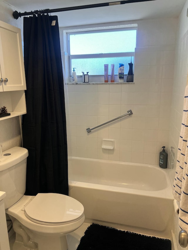 bathroom with toilet and shower / bathtub combination with curtain