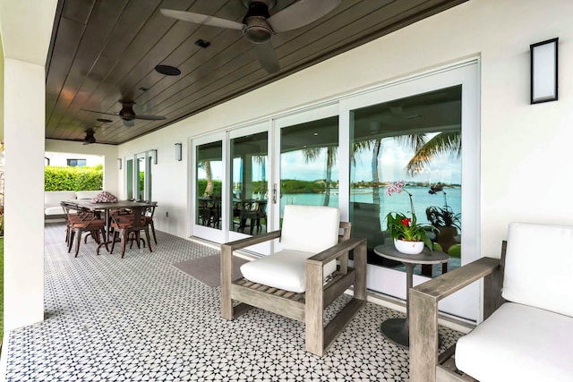 972 Marlin Dr, Jupiter, FL 33458 - view of patio featuring outdoor dining area and ceiling fan