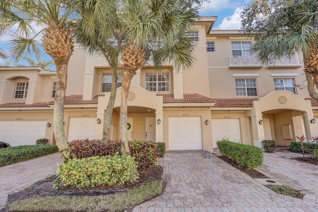 view of front of property with a garage