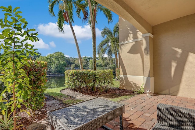 view of patio / terrace featuring a water view