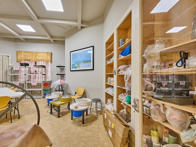 interior space with beamed ceiling and coffered ceiling