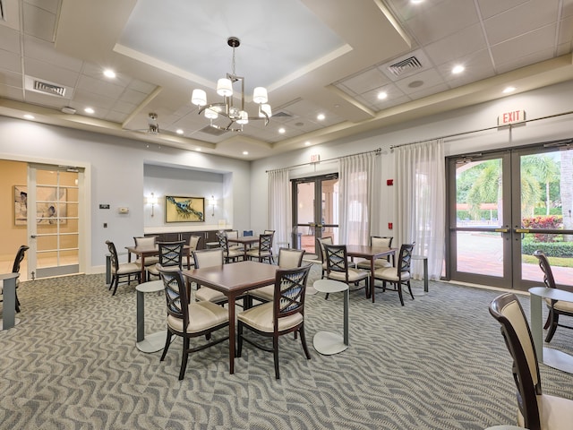 dining area with carpet flooring and french doors