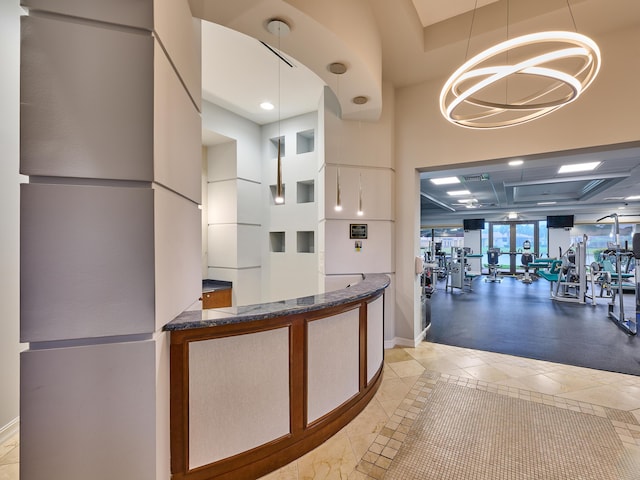 reception area featuring a chandelier