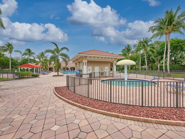 view of swimming pool featuring a patio