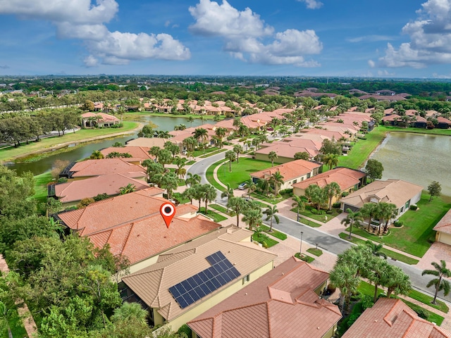 bird's eye view with a water view