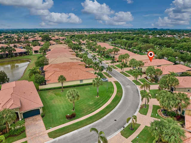 drone / aerial view featuring a water view