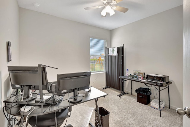 carpeted office with ceiling fan