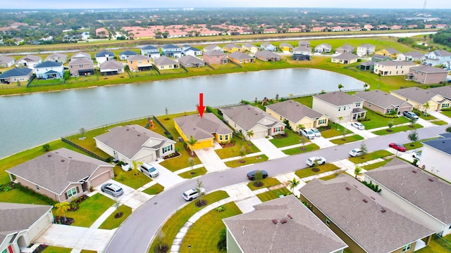 drone / aerial view with a water view