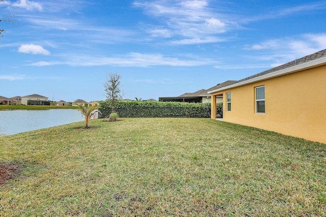 view of yard with a water view