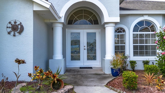 doorway to property featuring french doors