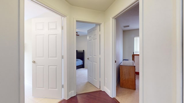 hallway featuring hardwood / wood-style floors