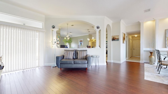 living room with ceiling fan, hardwood / wood-style floors, and crown molding