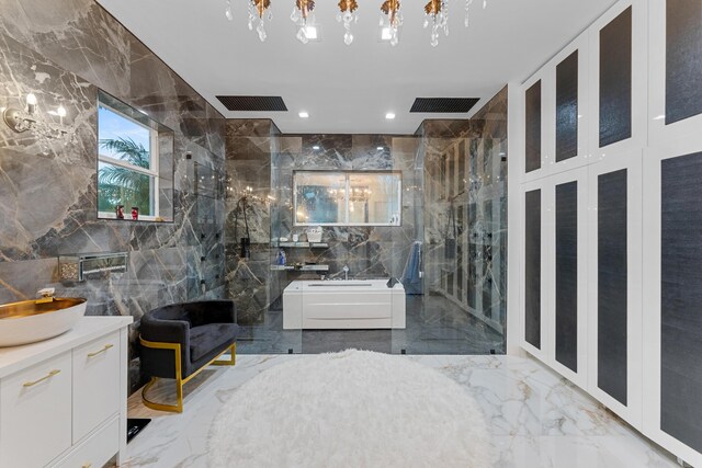 bathroom with a shower, tile walls, and vanity