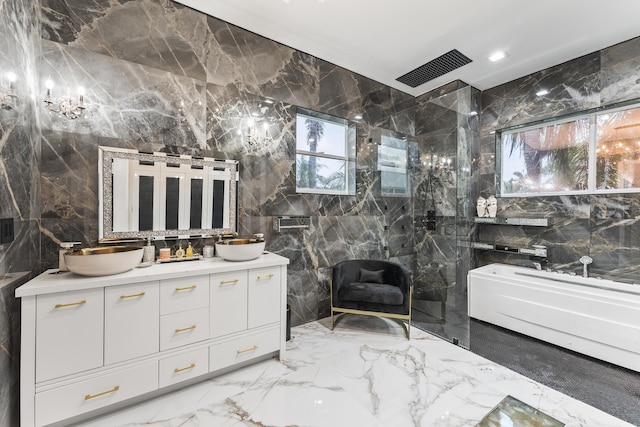 bathroom featuring tile walls, walk in shower, and vanity