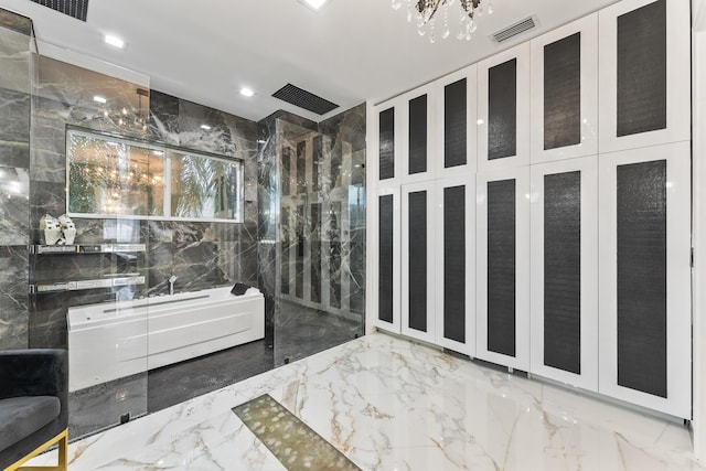 bathroom featuring separate shower and tub and tile walls