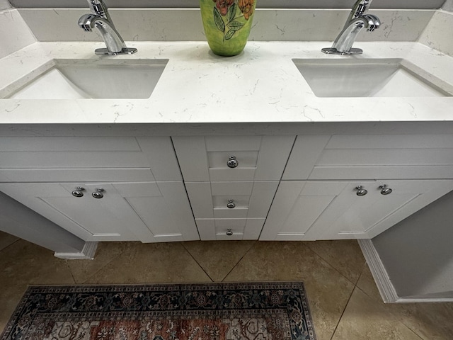 bathroom featuring tile patterned floors and vanity