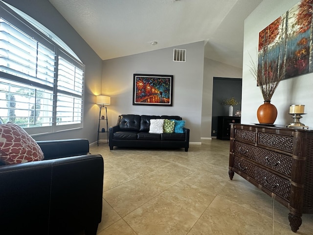 living room with vaulted ceiling