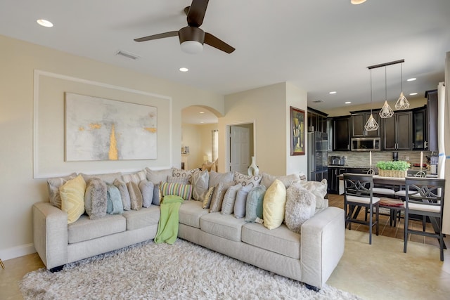 living room with ceiling fan