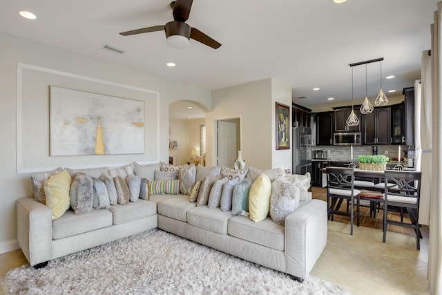 living room featuring ceiling fan