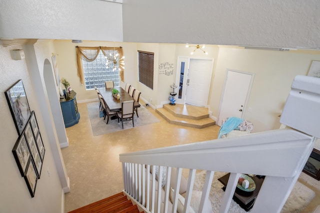 living room with a notable chandelier