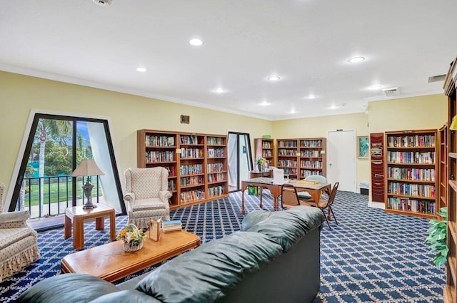 carpeted living room featuring ornamental molding