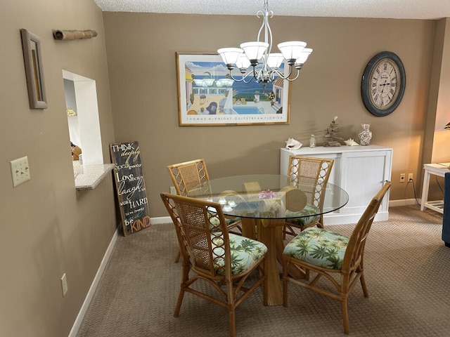 carpeted dining area featuring a chandelier