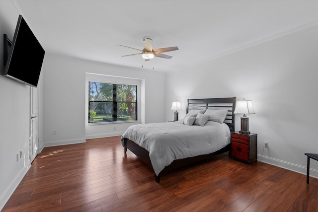 bedroom with ceiling fan and dark hardwood / wood-style floors