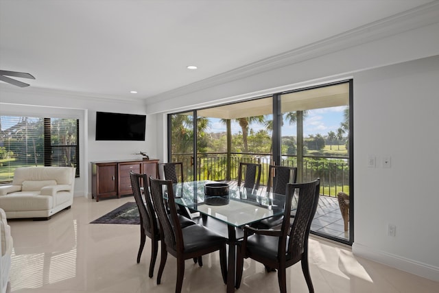 dining space with crown molding, a healthy amount of sunlight, and light tile patterned floors