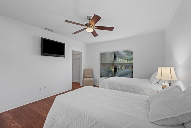 tiled bedroom featuring ceiling fan, ornamental molding, and french doors