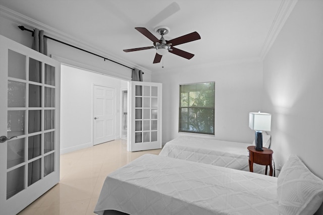 bedroom with ornamental molding, light tile patterned flooring, ceiling fan, and french doors