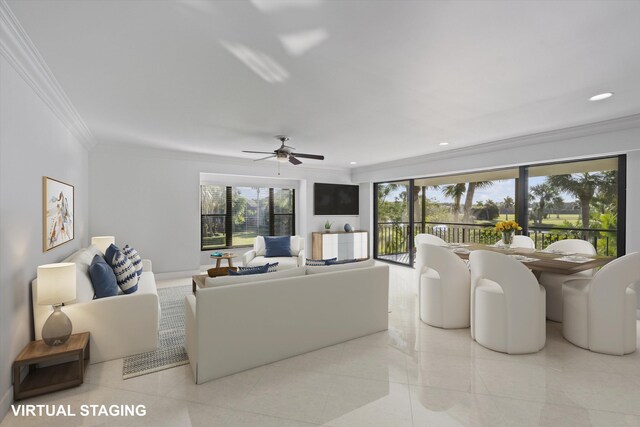 living room with ceiling fan and crown molding