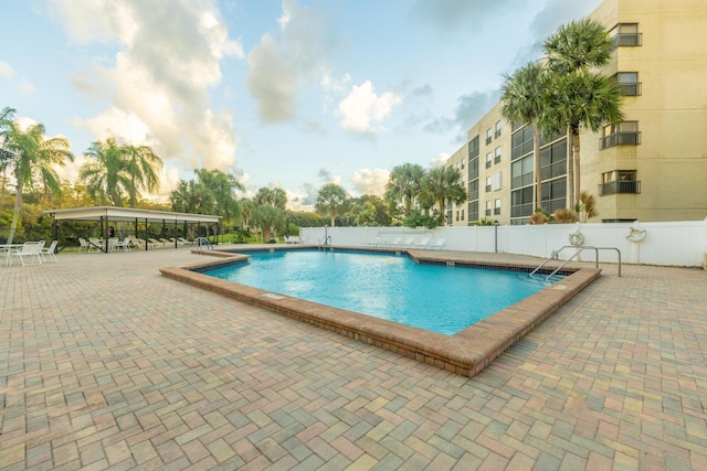 view of swimming pool featuring a patio