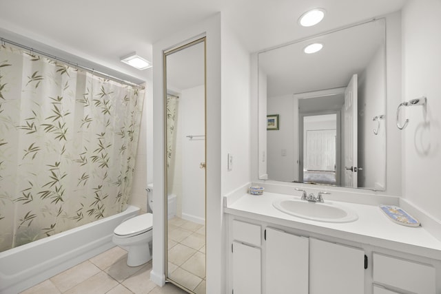 full bathroom with tile patterned flooring, vanity, shower / bathtub combination with curtain, and toilet