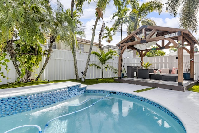 view of swimming pool featuring a gazebo and an outdoor hangout area