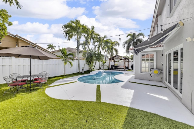 view of pool featuring a patio, a gazebo, and a lawn