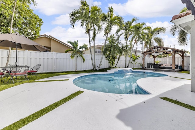 view of pool with a patio area and a gazebo