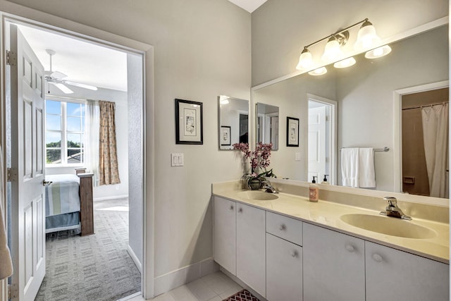 bathroom featuring vanity and ceiling fan