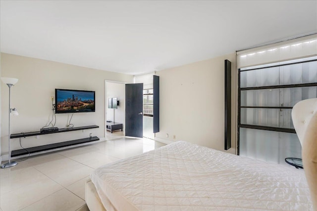 bedroom featuring light tile patterned floors