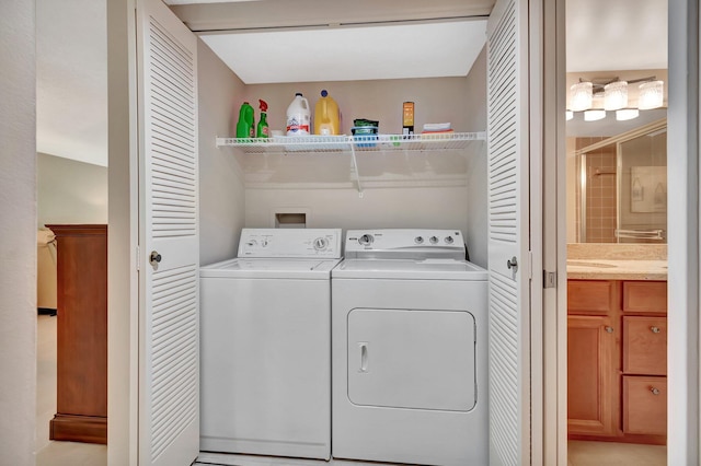 laundry area featuring washing machine and dryer