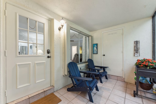 interior space featuring light tile patterned flooring