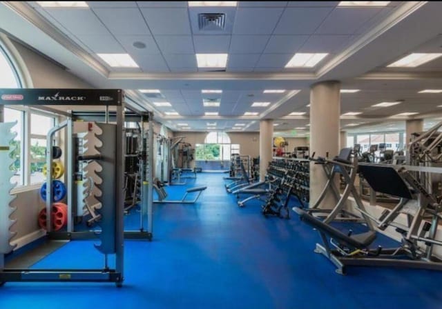 workout area with a drop ceiling