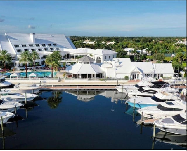 birds eye view of property featuring a water view