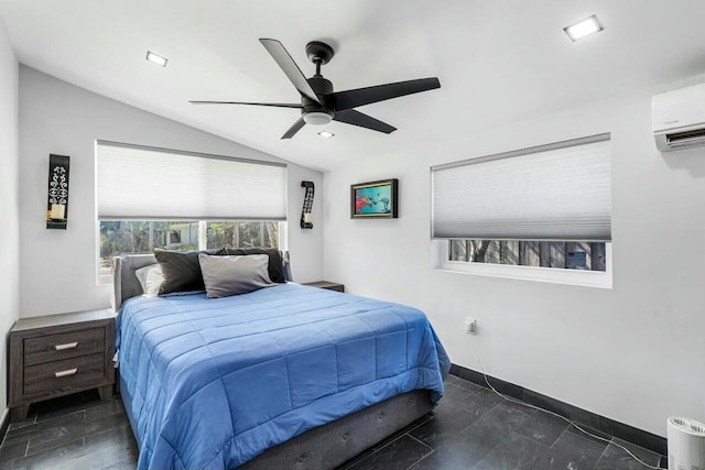 bedroom featuring ceiling fan, vaulted ceiling, and a wall mounted AC