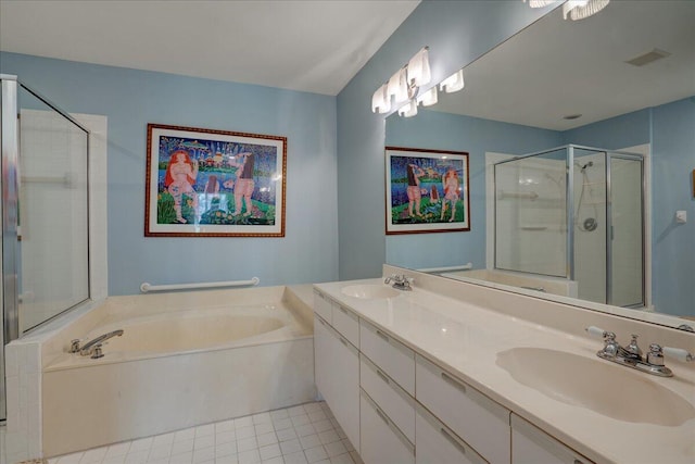 bathroom featuring separate shower and tub, tile patterned floors, and vanity