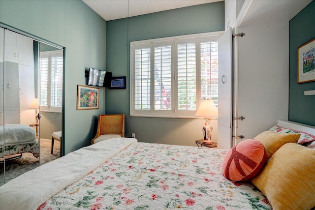 bedroom featuring multiple windows