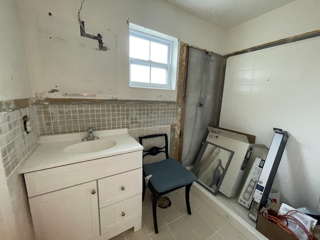 bathroom featuring vanity and tile patterned flooring