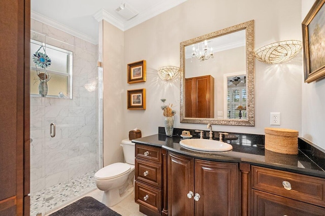 bathroom with tile patterned floors, toilet, an enclosed shower, crown molding, and vanity