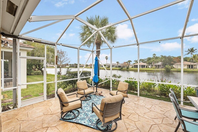 sunroom with a water view